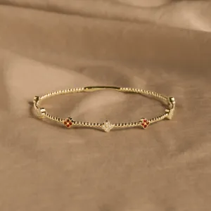 14K Yellow Gold Natural Ruby Diamond Clover Beaded Flexible Bangle