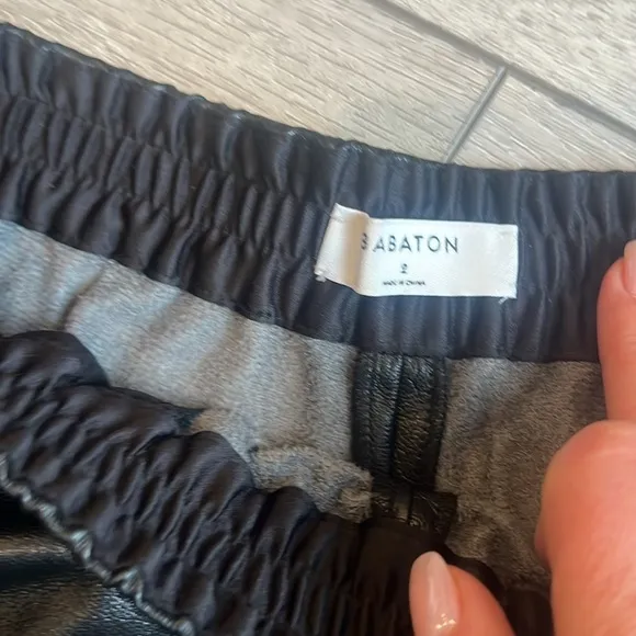 Babaton Aritzia Margin Black Faux Vegan Leather Shorts size 2