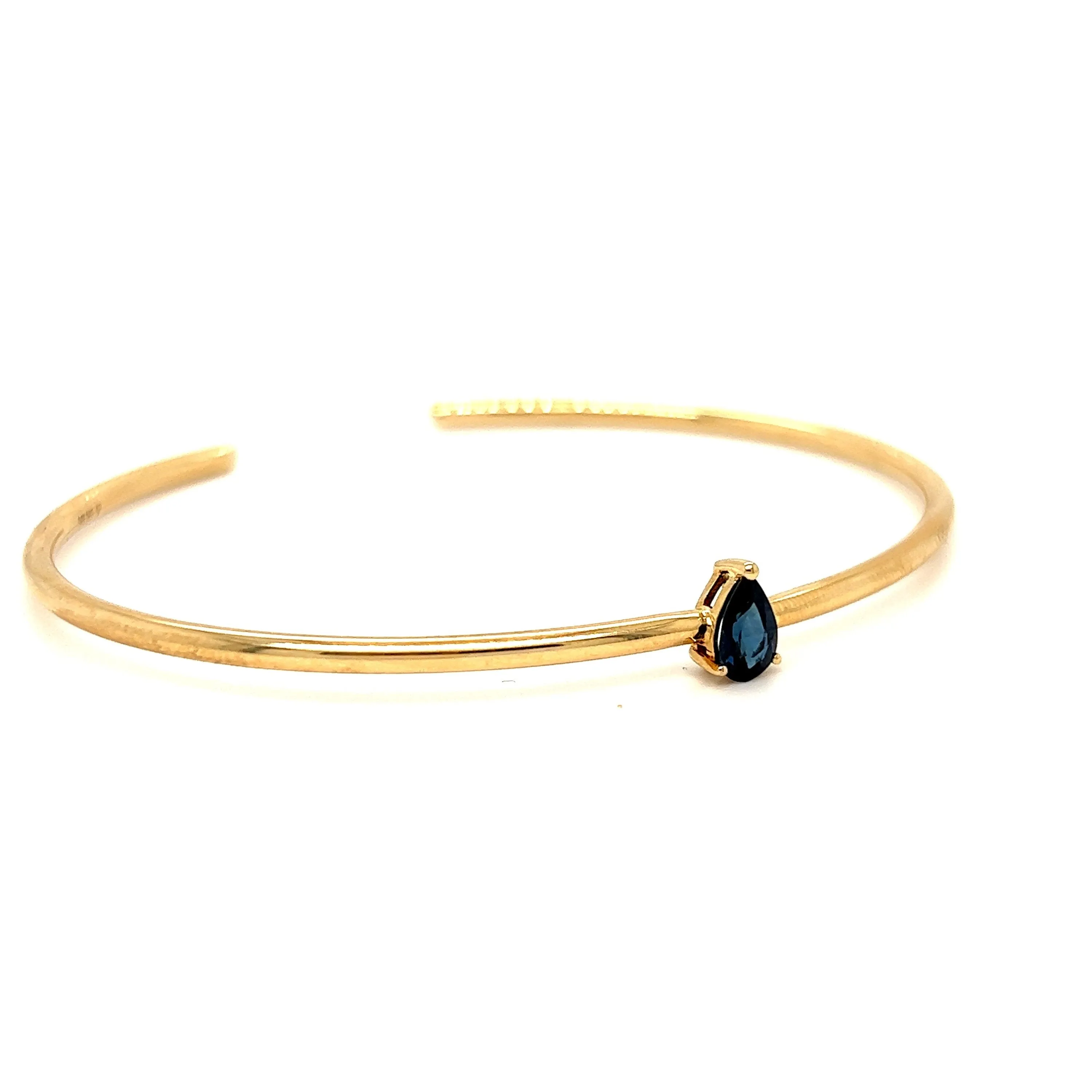 Simple Modern 14K Yellow Gold Flexible Sapphire Bangle Bracelet.