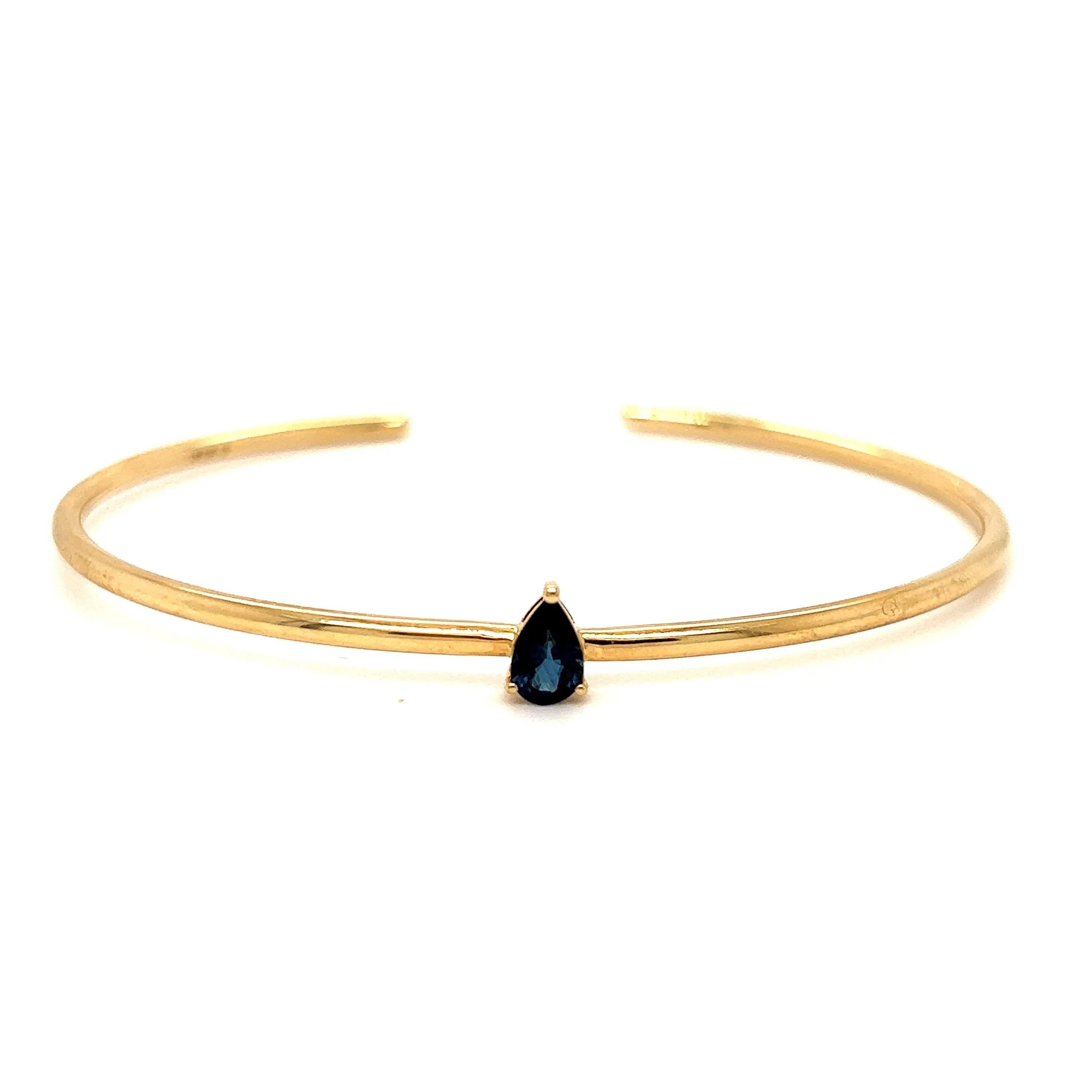 Simple Modern 14K Yellow Gold Flexible Sapphire Bangle Bracelet.