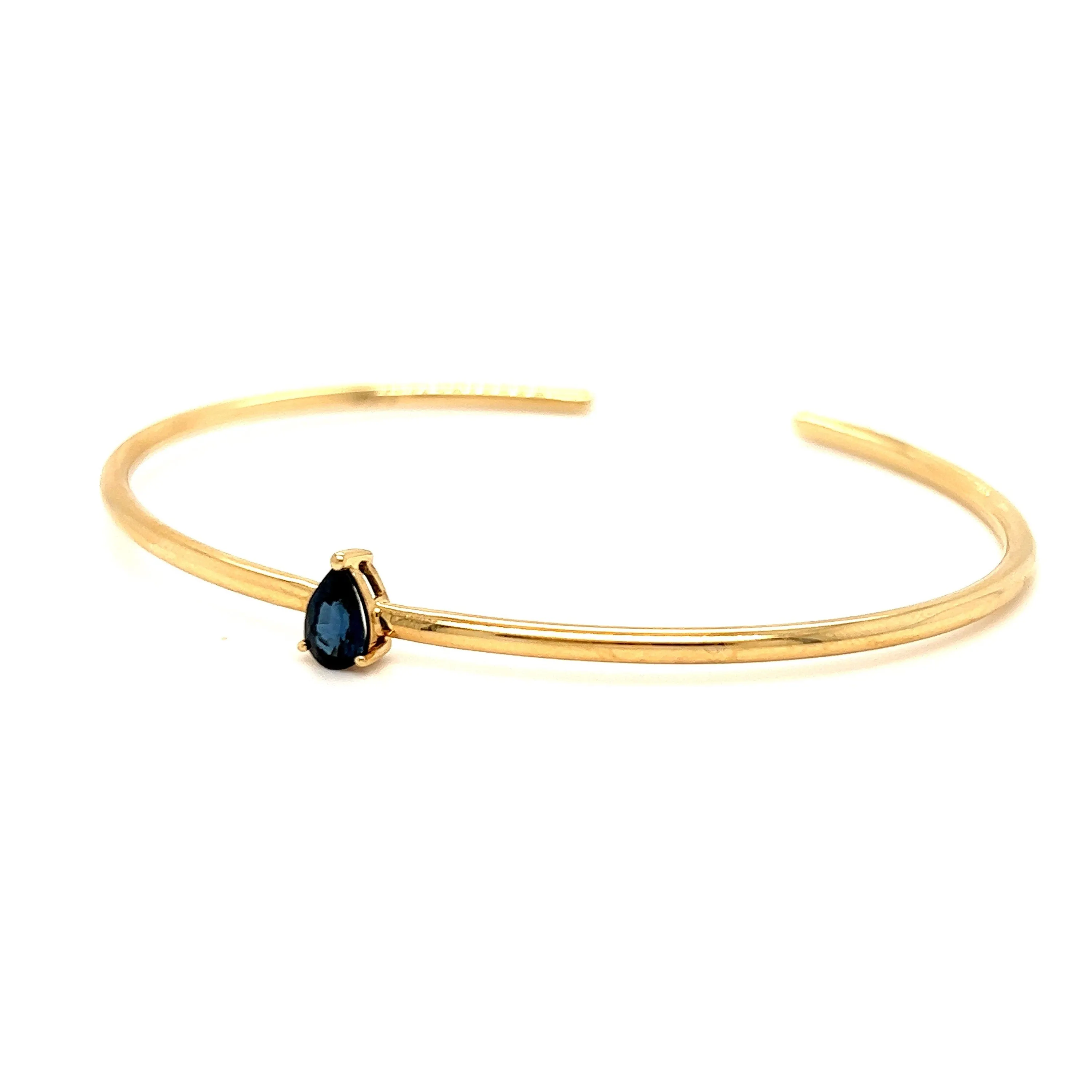 Simple Modern 14K Yellow Gold Flexible Sapphire Bangle Bracelet.